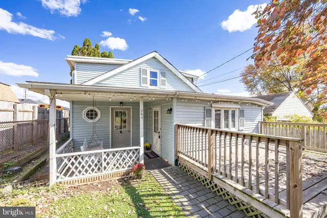 a front view of a house with a porch