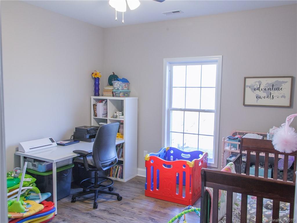 3018 Ranger Road, Unit 2B Clover, SC 29710 - Photo 17 of 23 a bedroom with furniture and a window