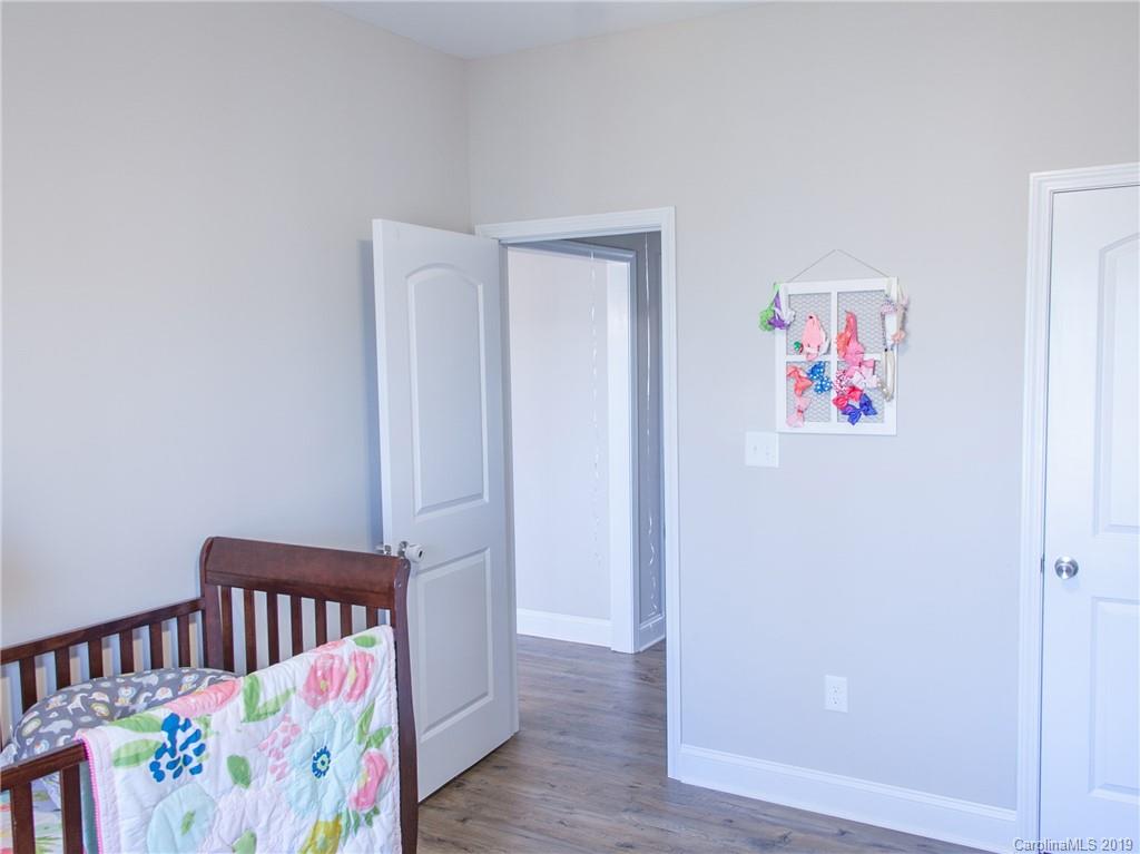 3018 Ranger Road, Unit 2B Clover, SC 29710 - Photo 18 of 23 a view of a way to room with wooden floor and windows