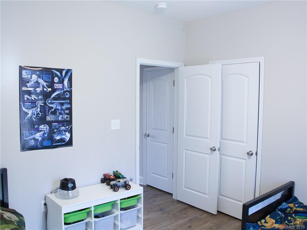 3018 Ranger Road, Unit 2B Clover, SC 29710 - Photo 20 of 23 a workspace with furniture and wooden floor