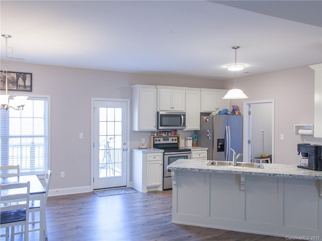 3018 Ranger Road, Unit 2B Clover, SC 29710 - Photo 8 of 23 a view of kitchen with sink refrigerator and window