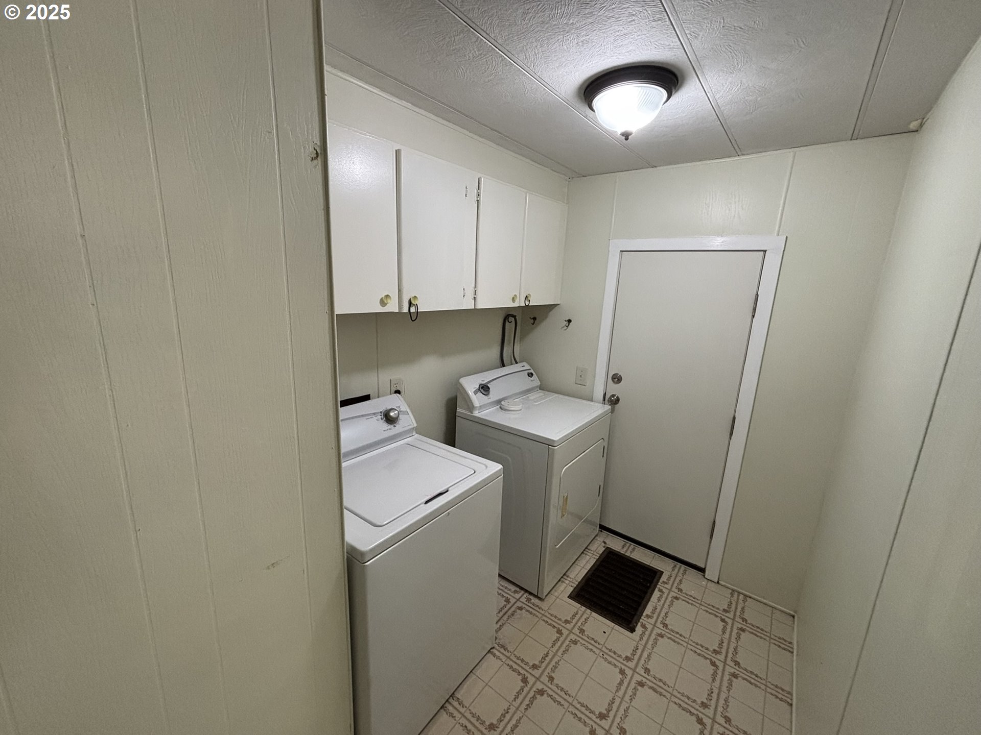 5336 Buckskin Bob Florence, OR 97439 - Photo 18 of 36 a view of storage and utility room with washer and dryer