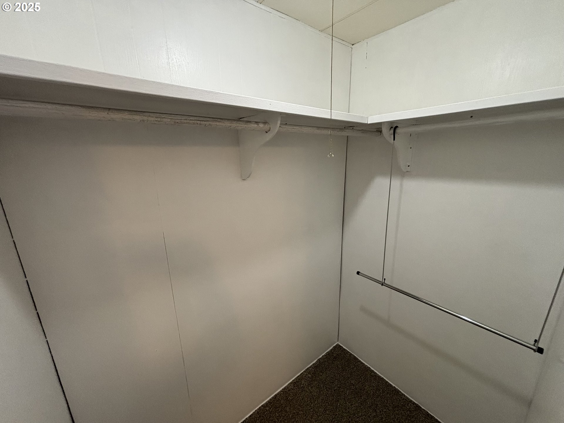 5336 Buckskin Bob Florence, OR 97439 - Photo 25 of 36 a view of an empty walk in closet