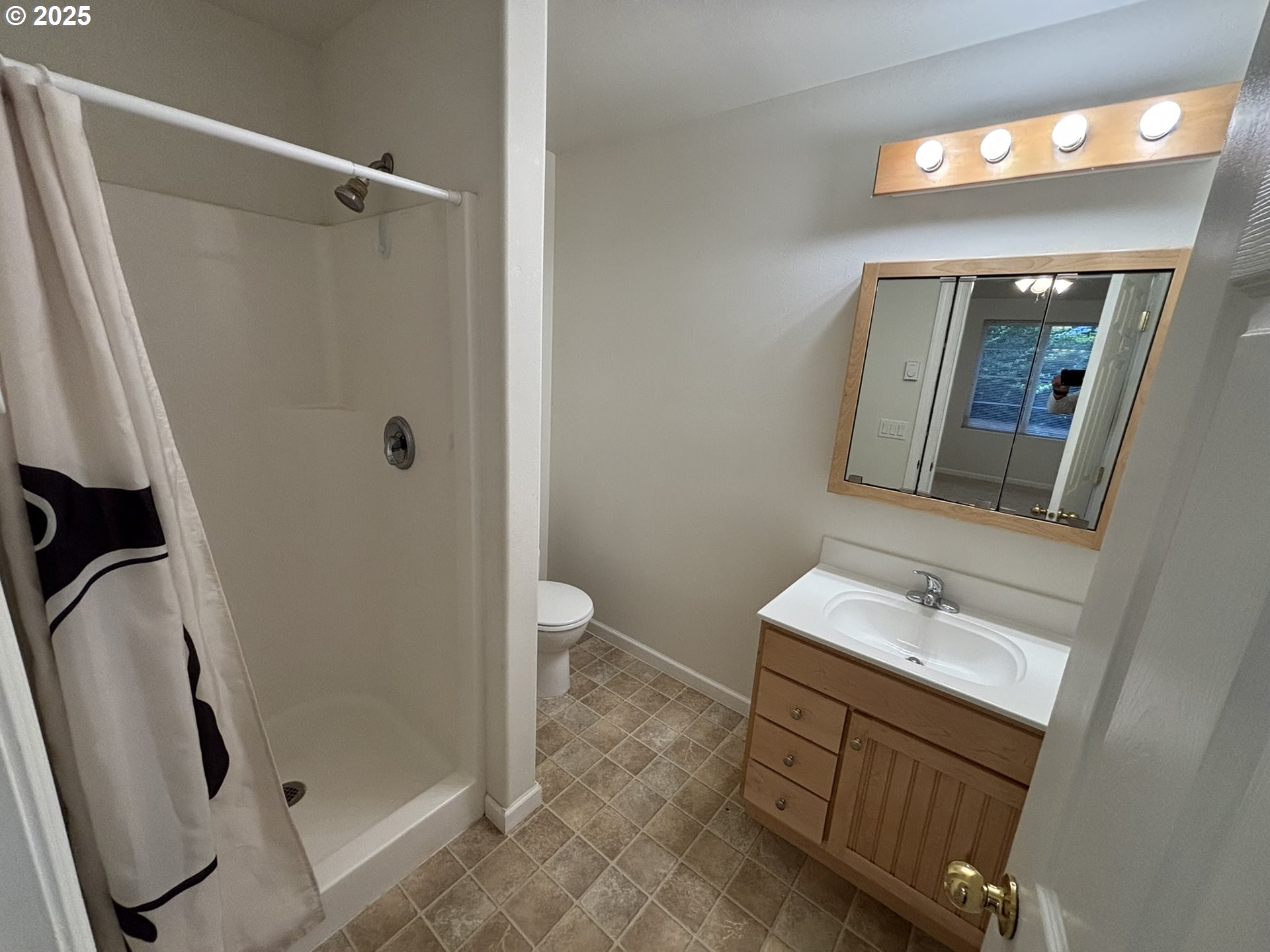 5336 Buckskin Bob Florence, OR 97439 - Photo 8 of 36 a bathroom with a sink a toilet and shower