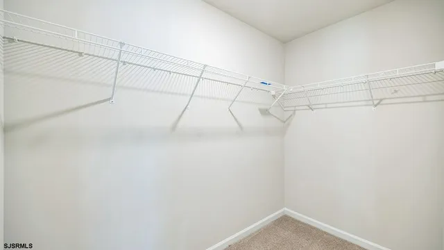 a view of a room with racks on the wall