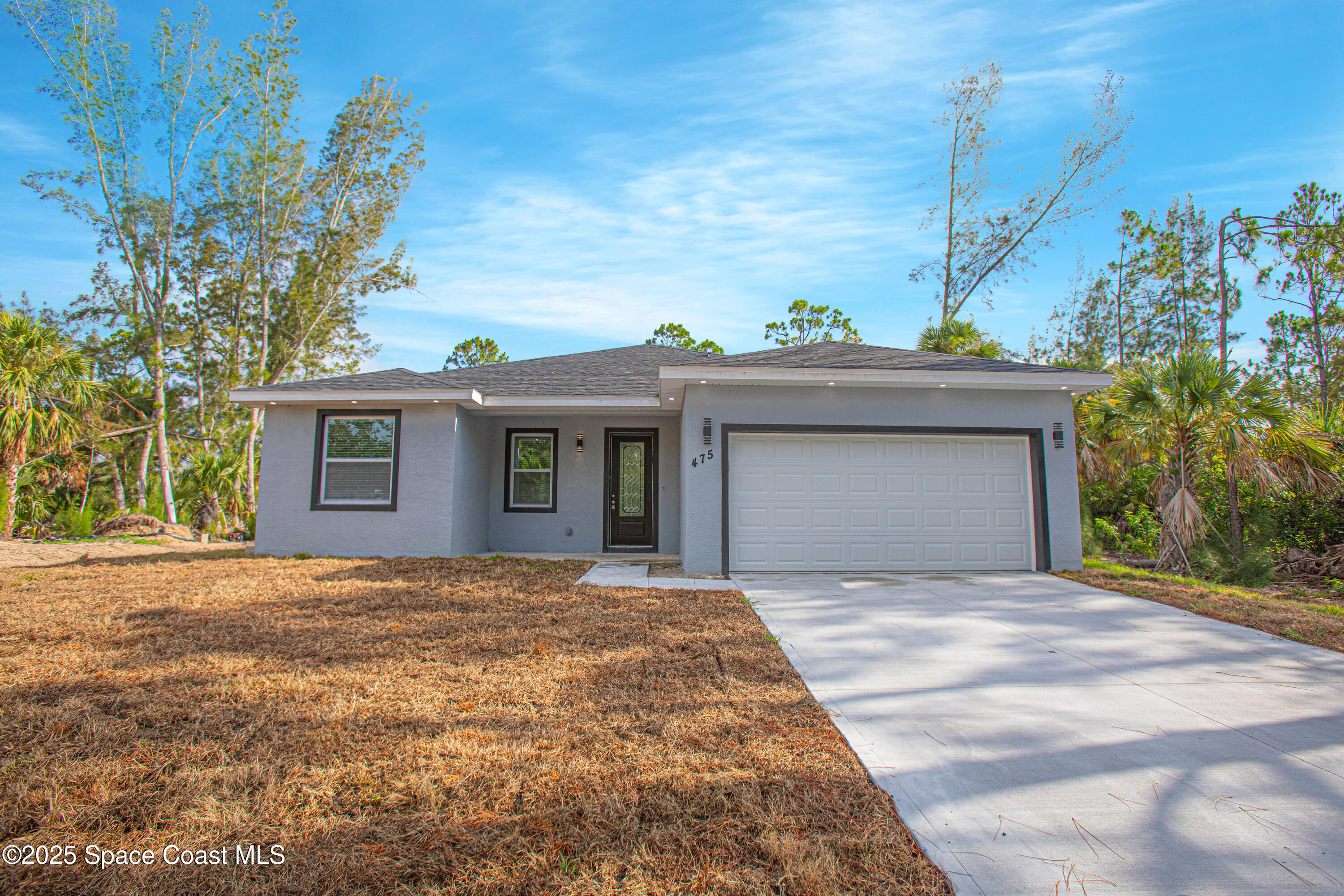 475 La Coco Street Southwest Palm Bay, FL 32908 - Photo 1 of 28 475-LaCocoStSW-Exterior-5