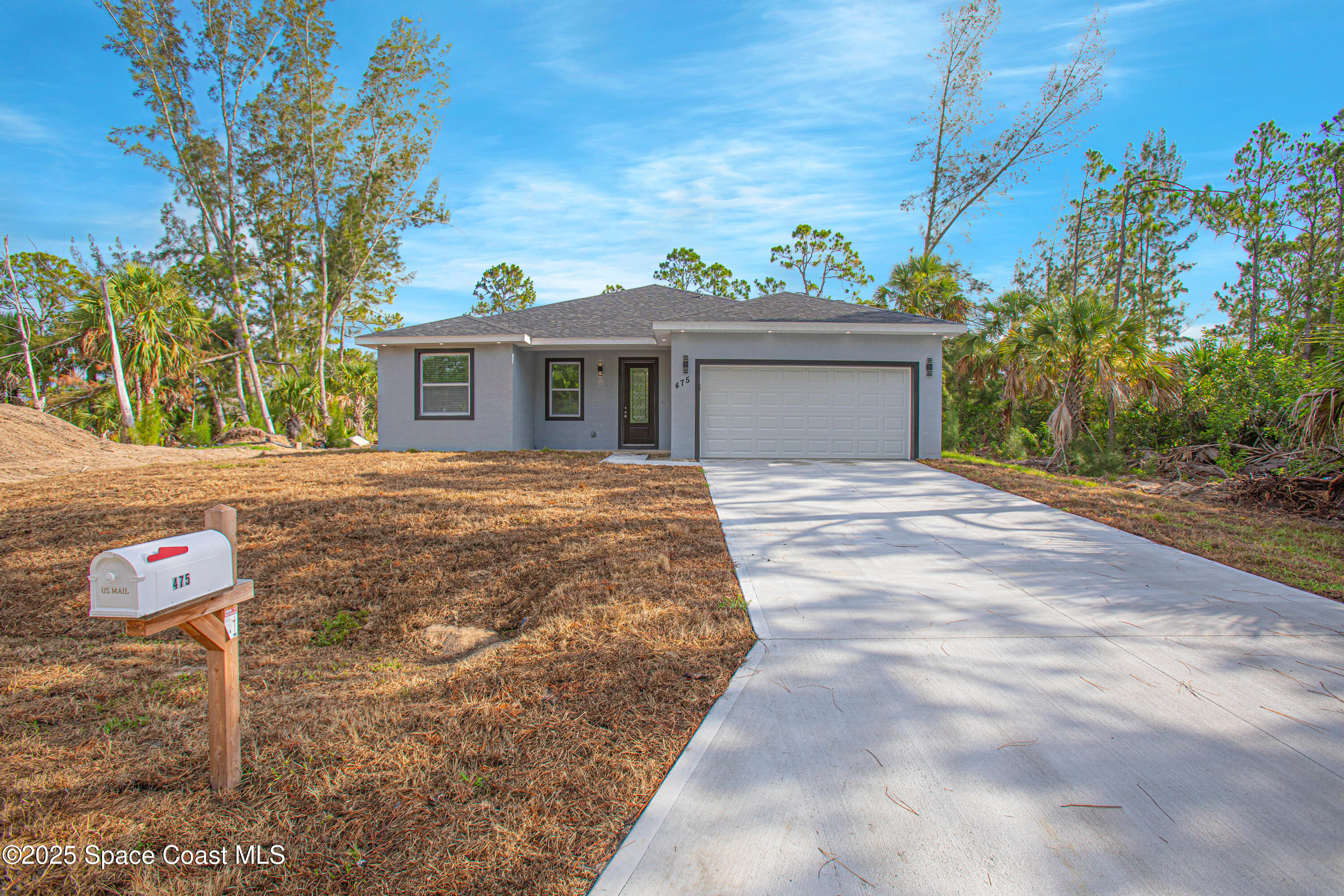 475 La Coco Street Southwest Palm Bay, FL 32908 - Photo 2 of 28 475-LaCocoStSW-Exterior-3