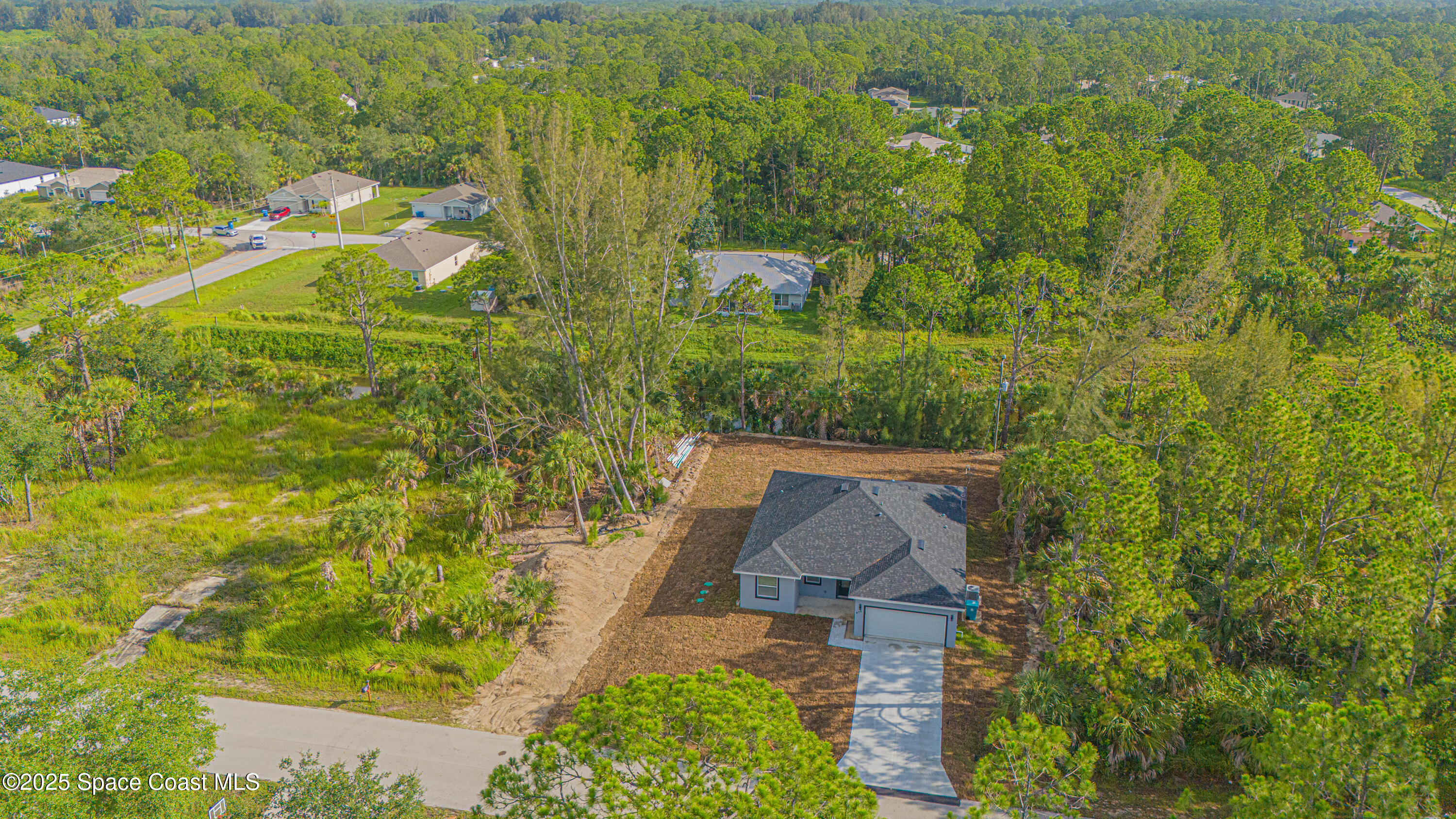 475 La Coco Street Southwest Palm Bay, FL 32908 - Photo 3 of 28 475-LaCocoStSW-Aerial-19