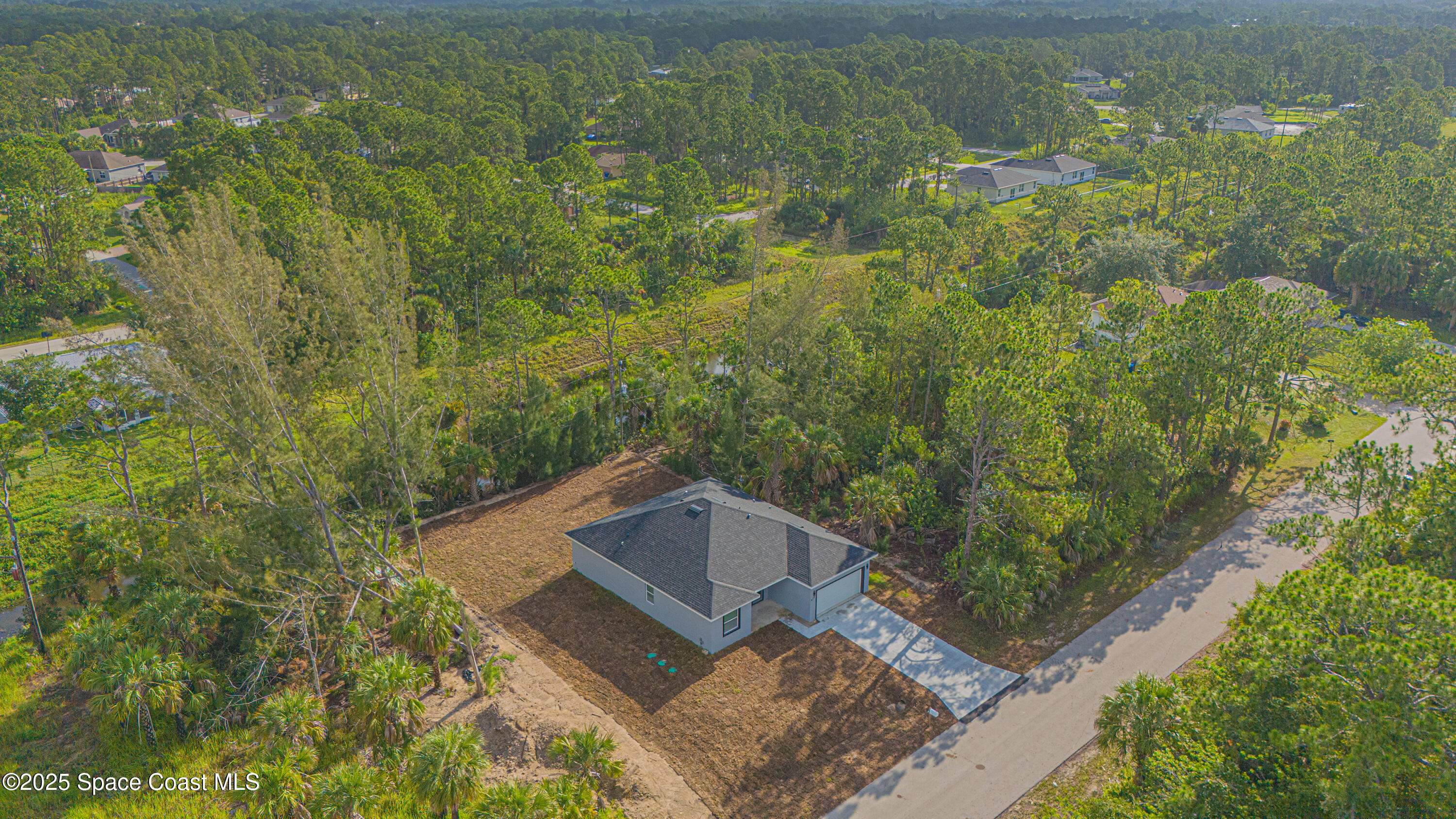 475 La Coco Street Southwest Palm Bay, FL 32908 - Photo 4 of 28 475-LaCocoStSW-Aerial-16