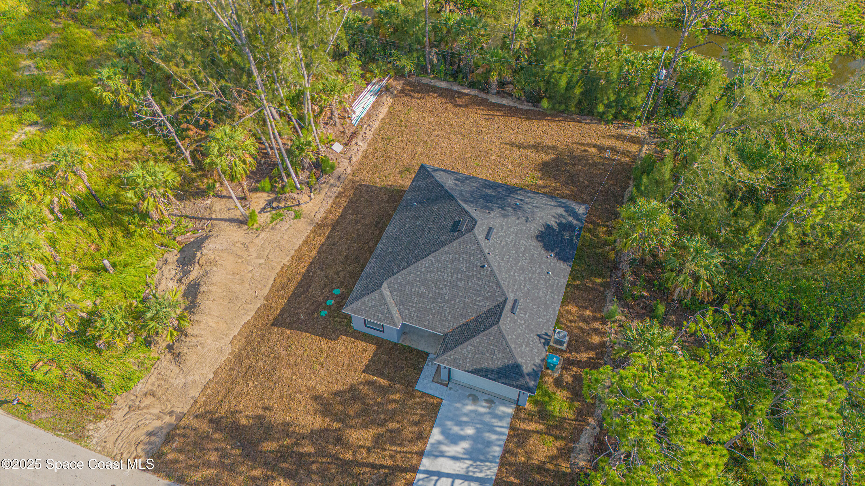 475 La Coco Street Southwest Palm Bay, FL 32908 - Photo 5 of 28 475-LaCocoStSW-Aerial-9