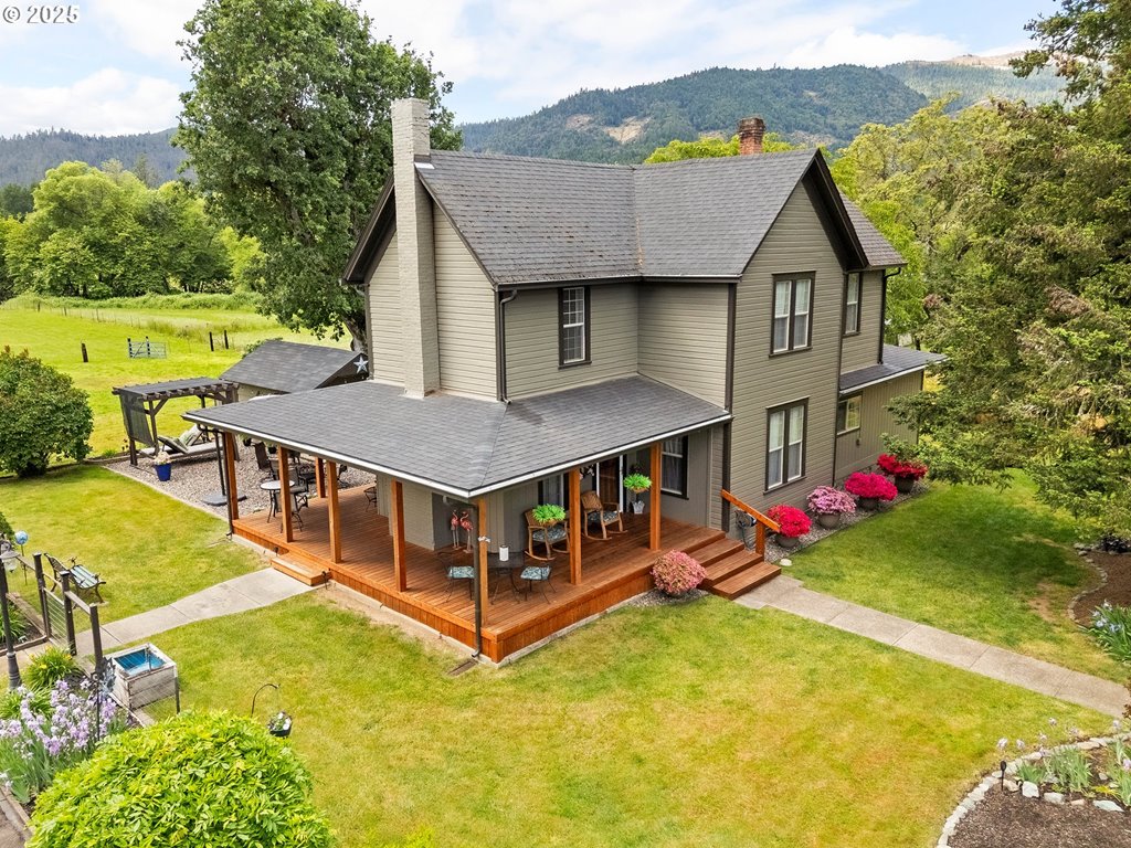 4500 Glenbrook Loop Road Riddle, OR 97469 - Photo 1 of 46 an aerial view of a house