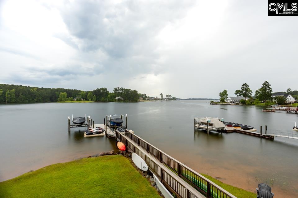 357 Cabana Way Lexington, SC 29072 - Photo 5 of 25 a view of a lake with boats and trees in the background