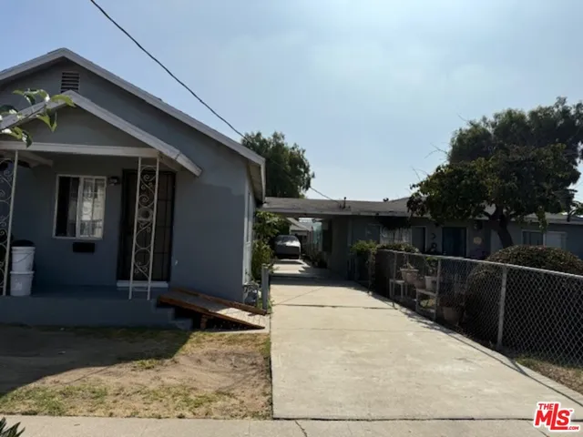 a house with trees in the background