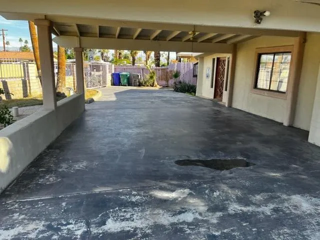 a view of an empty room with a fireplace
