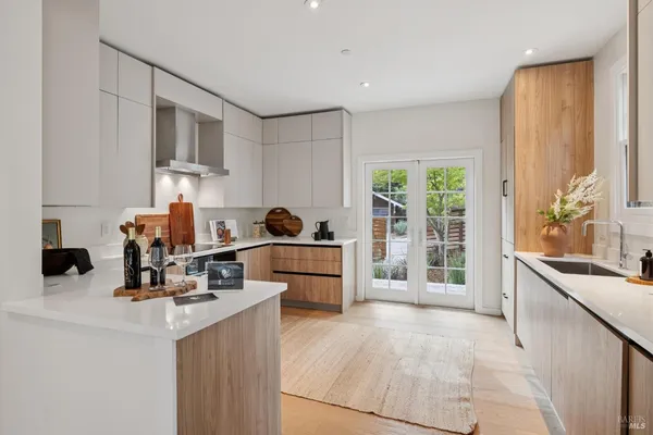 a living room with furniture and a book shelf