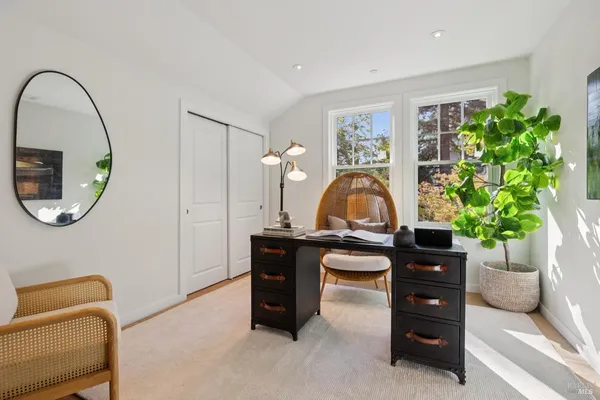 a view of a dining room with furniture window and outside view
