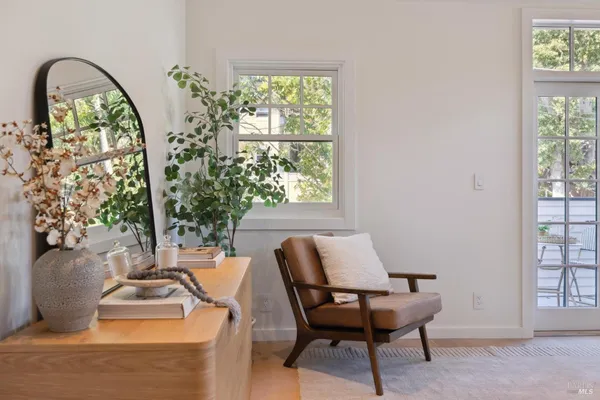 a bedroom with a bed and a couch