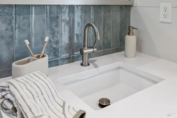 a view of a house with a yard and a porch