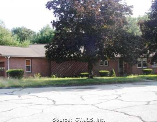 227 Ballouville Road Killingly, CT 06241 - Photo 1 of 1 a backyard of a house with lots of green space
