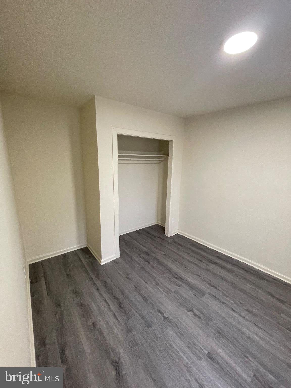2441 North 5th Street Philadelphia, PA 19133 - Photo 15 of 19 a view of an empty room with wooden floor