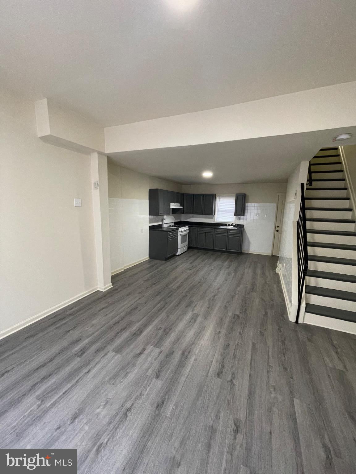 2441 North 5th Street Philadelphia, PA 19133 - Photo 5 of 19 a view of empty room with wooden floor