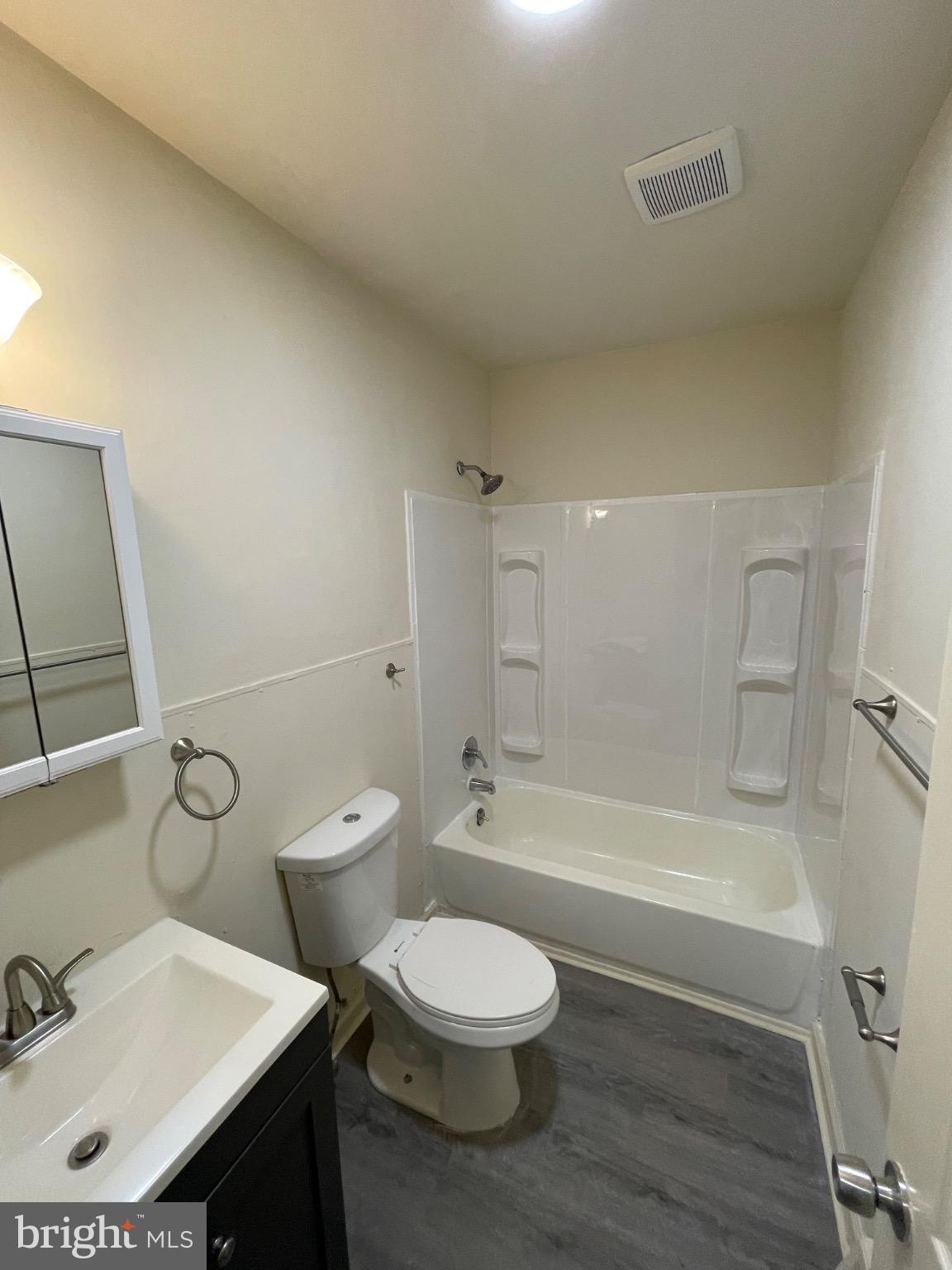 2441 North 5th Street Philadelphia, PA 19133 - Photo 10 of 19 a bathroom with a toilet a sink and bathtub