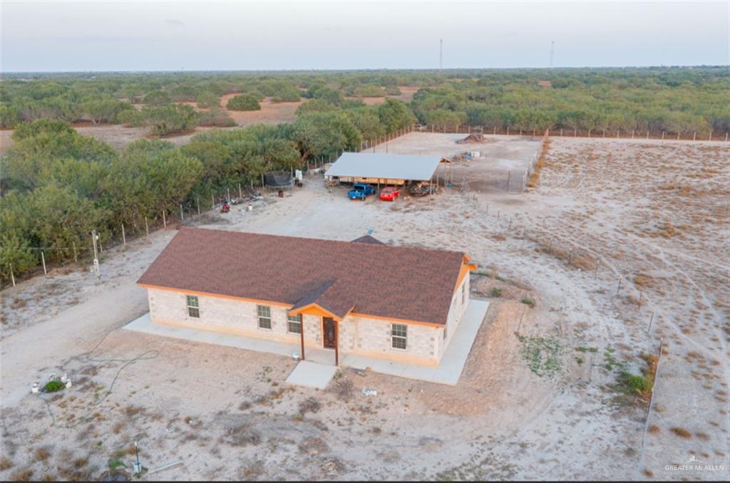 4 Mile 4 Road Penitas, TX 78576 - Photo 2 of 12 an aerial view of a house with outdoor space