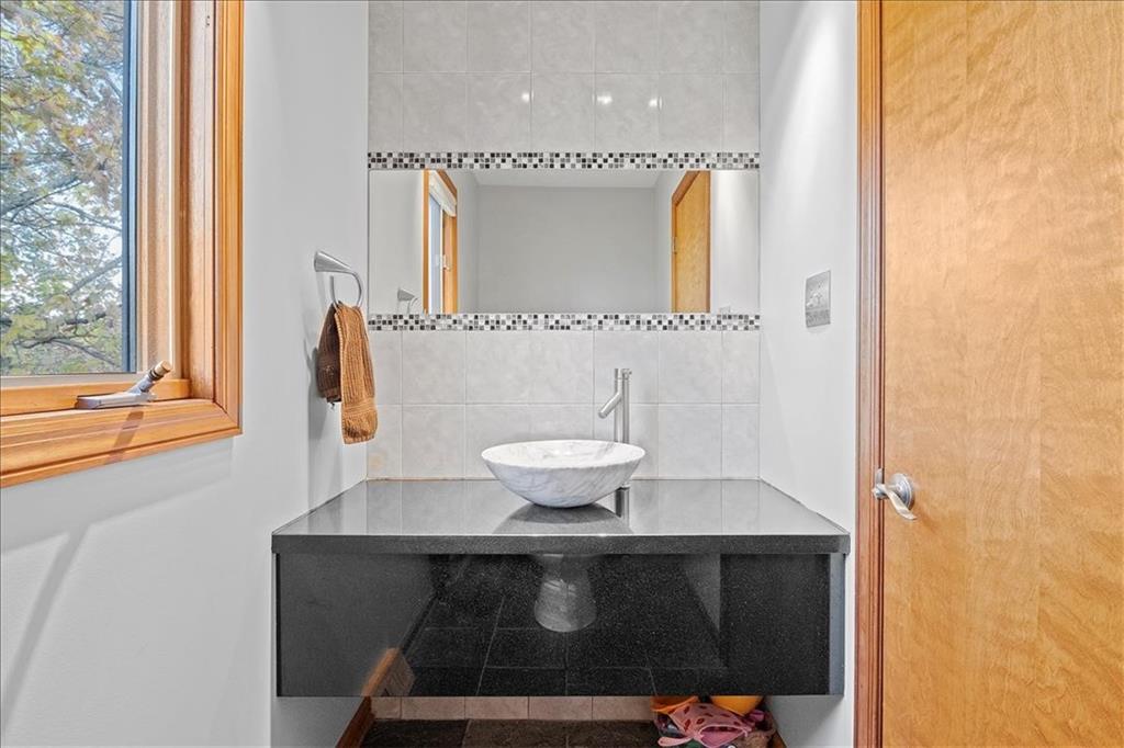 205 Constance Drive McKees Rocks, PA 15136 - Photo 11 of 25 a view of bathroom with a sink and a mirror