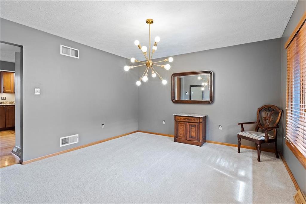 205 Constance Drive McKees Rocks, PA 15136 - Photo 7 of 25 a view of a workspace with furniture and a window