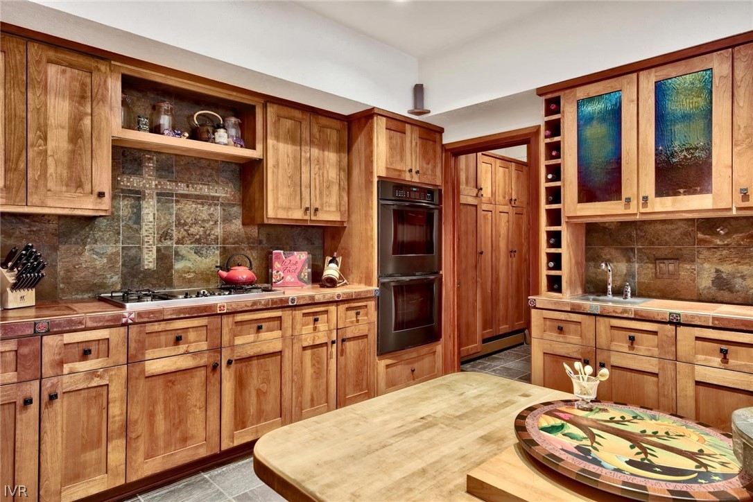 976 Tee Court Incline Village, NV 89451 - Photo 17 of 34 a kitchen with stainless steel appliances granite countertop a sink and cabinets