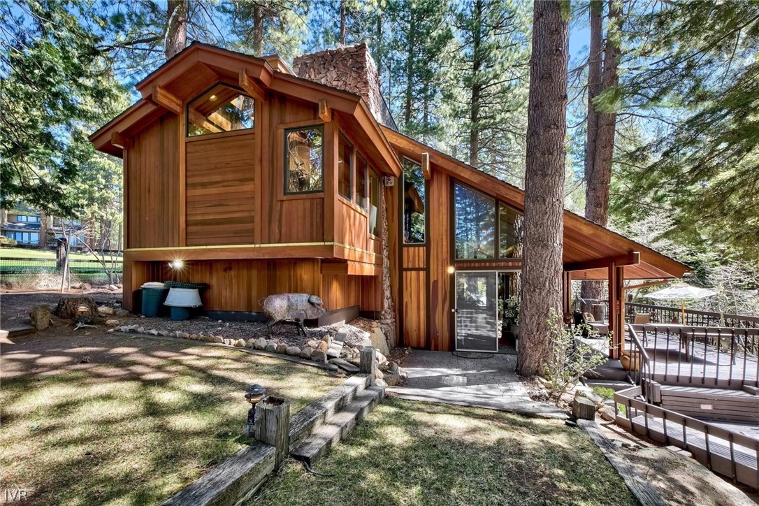 976 Tee Court Incline Village, NV 89451 - Photo 2 of 34 a view of a house with backyard