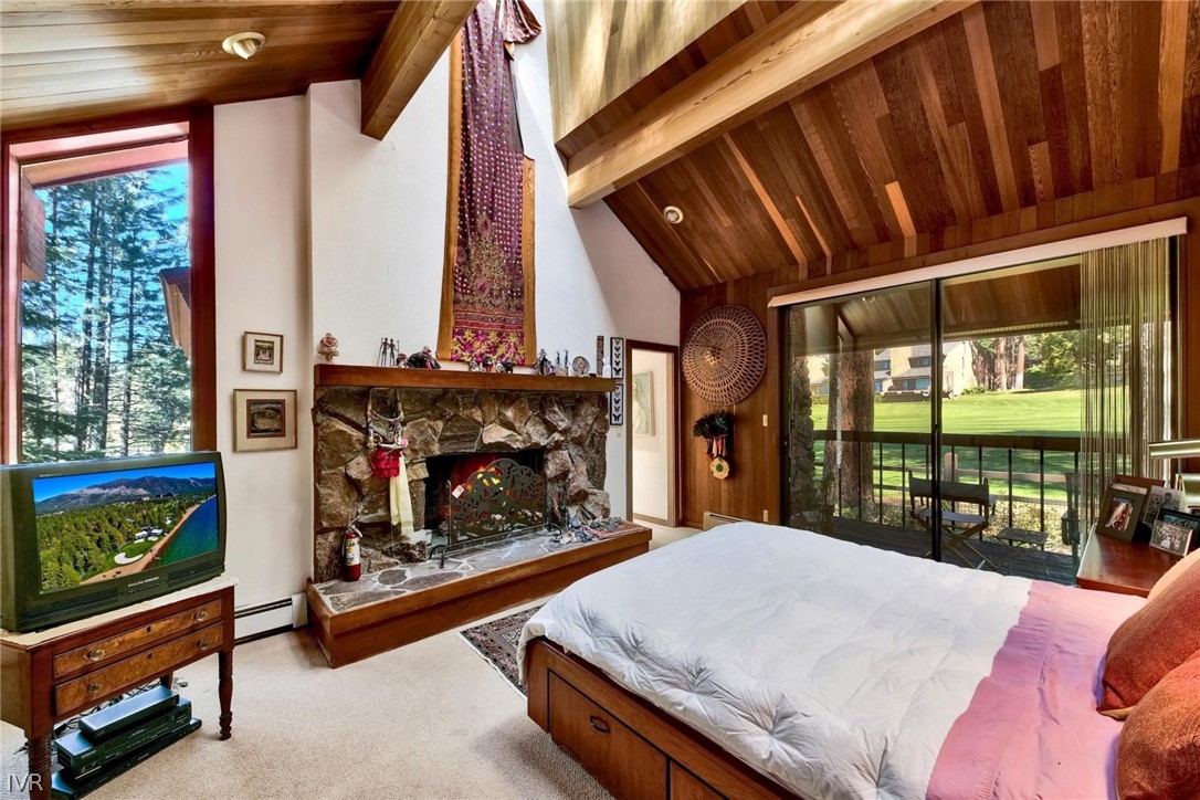 976 Tee Court Incline Village, NV 89451 - Photo 21 of 34 a bed sitting in a bedroom next to a window