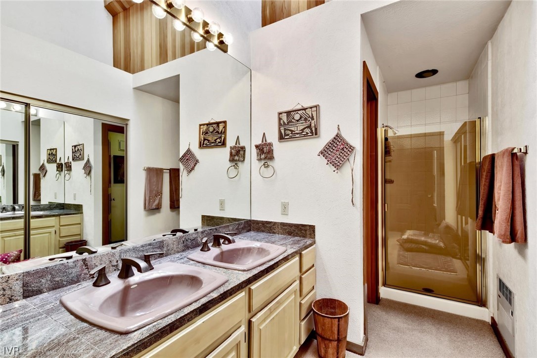 976 Tee Court Incline Village, NV 89451 - Photo 25 of 34 a bathroom with a sink double vanity and a mirror
