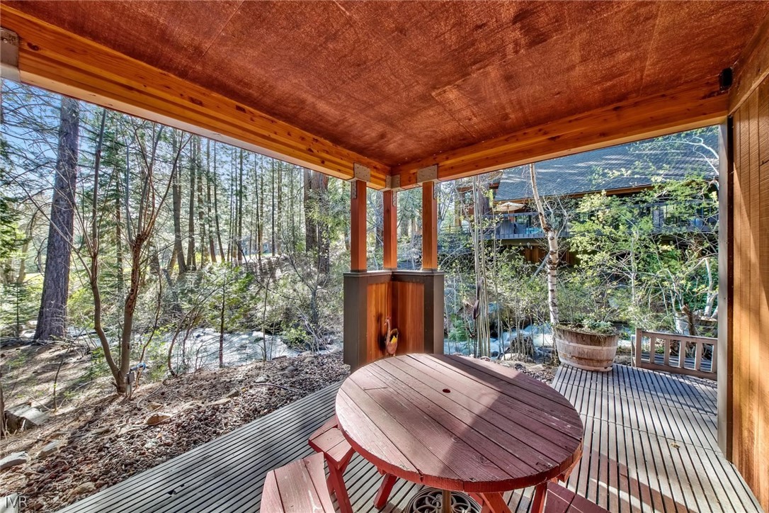 976 Tee Court Incline Village, NV 89451 - Photo 33 of 34 a view of porch with a table and chairs