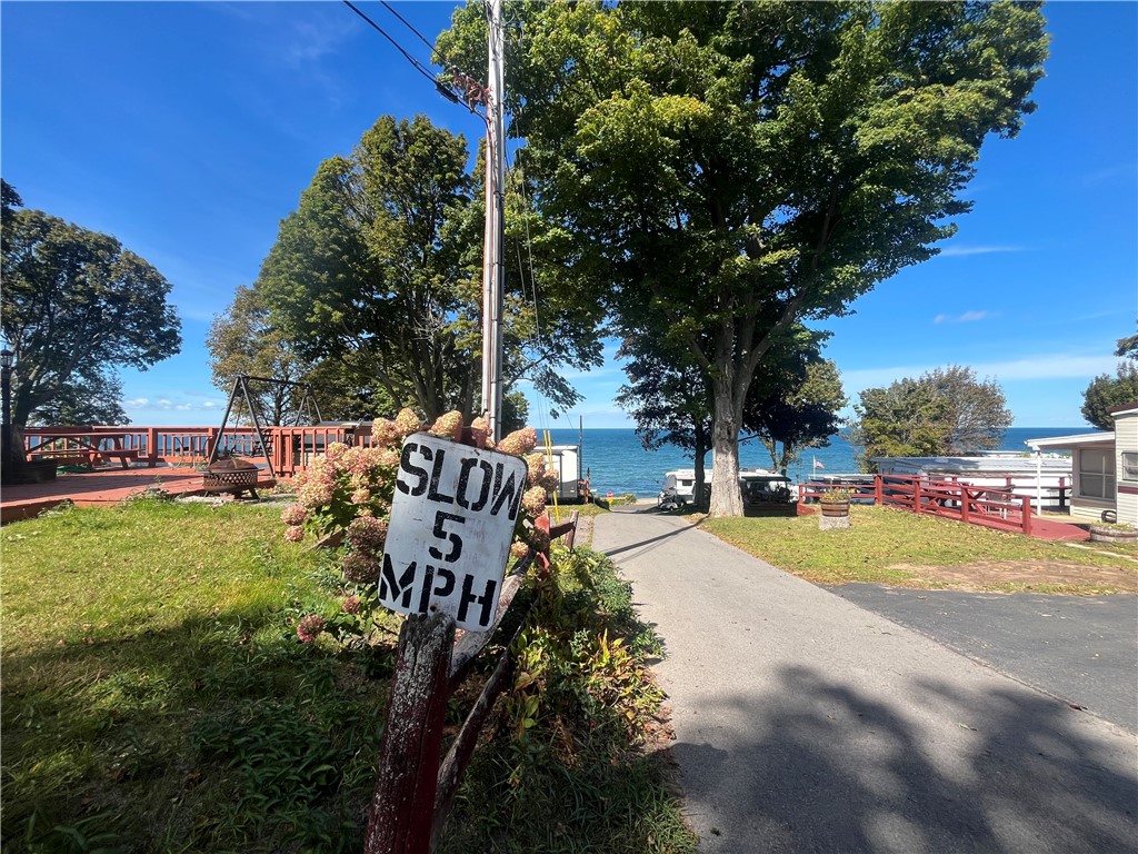 7945 Lake Road, Unit 34 Sodus, NY 14555 - Photo 22 of 24 A SHORT STROLL TO BEAUTIFUL LAKE VIEWS!