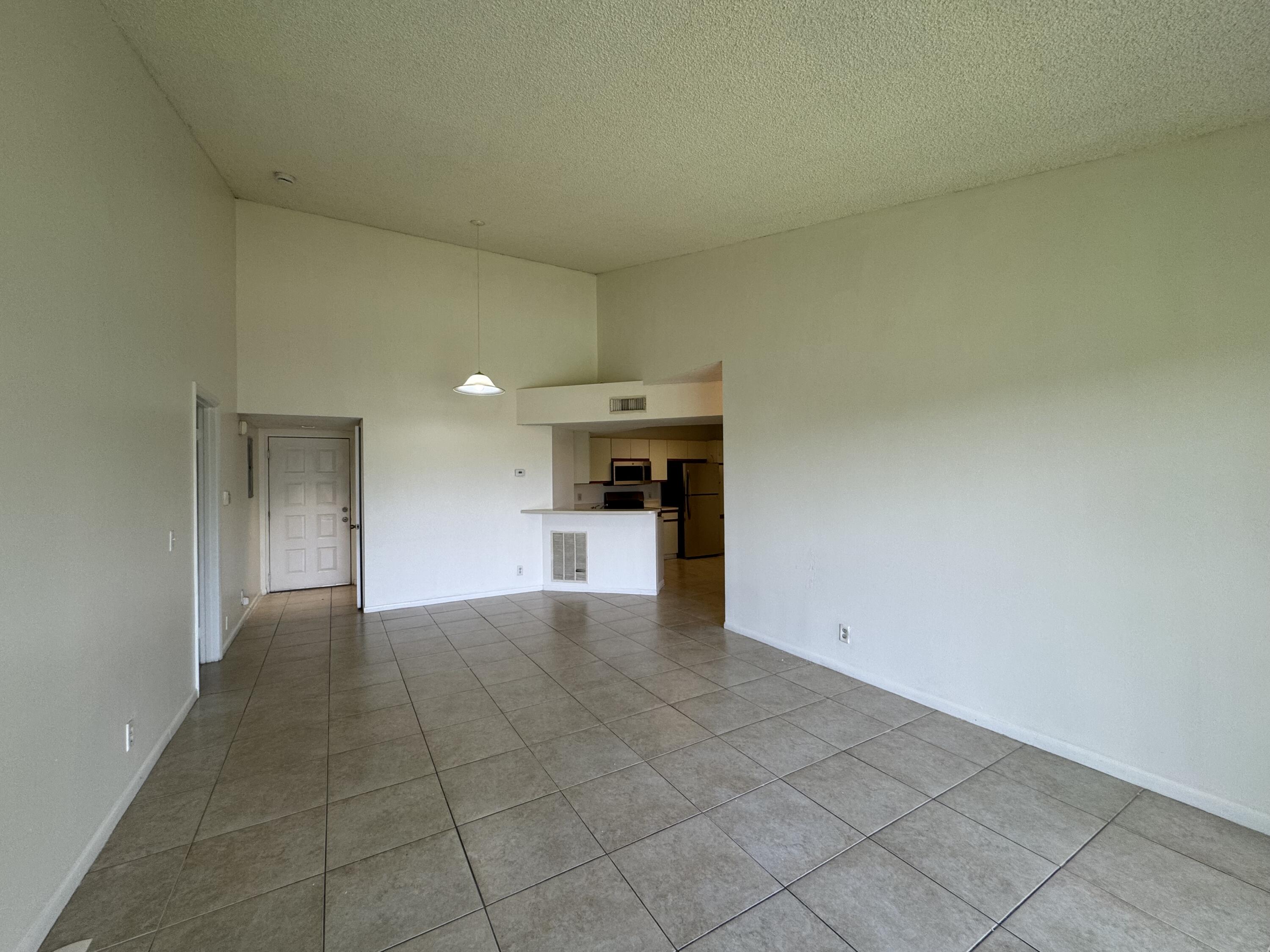 8891 Wiles Road, Unit 303 Coral Springs, FL 33067 - Photo 6 of 10 IMG_3461