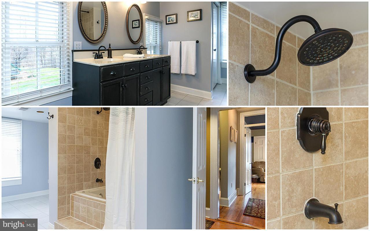 2224 White Hall Road White Hall, MD 21161 - Photo 22 of 30 a bathroom with a sink mirror toilet and shower