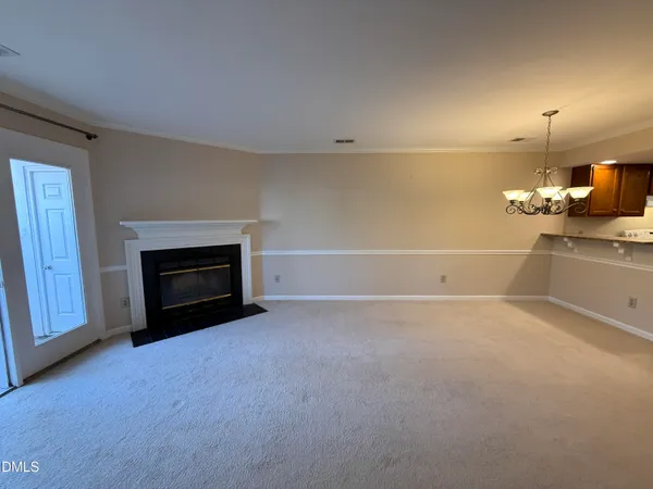 a view of a livingroom with a fireplace