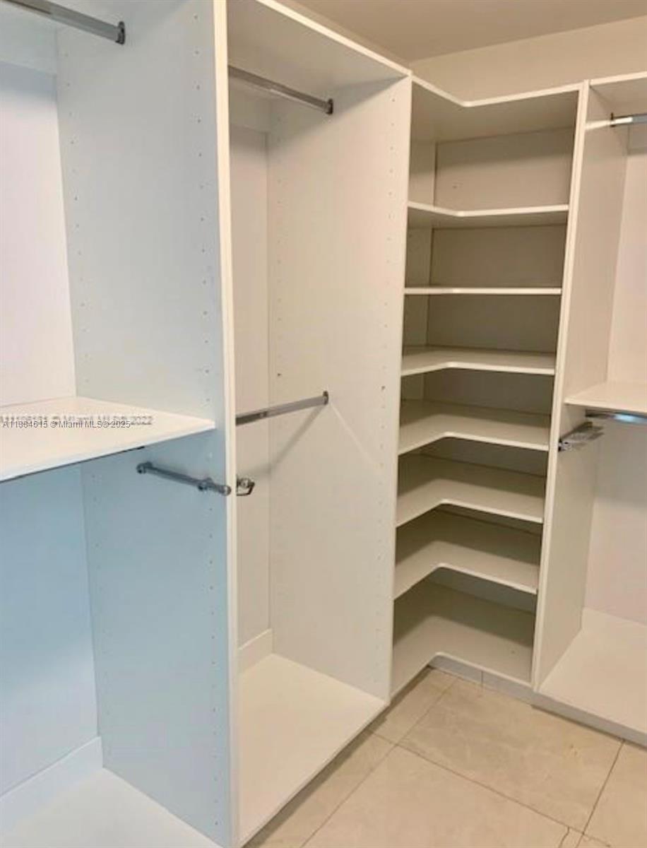 Key Biscayne Key Biscayne, FL 33149 - Photo 12 of 17 a view of walk in closet with empty racks
