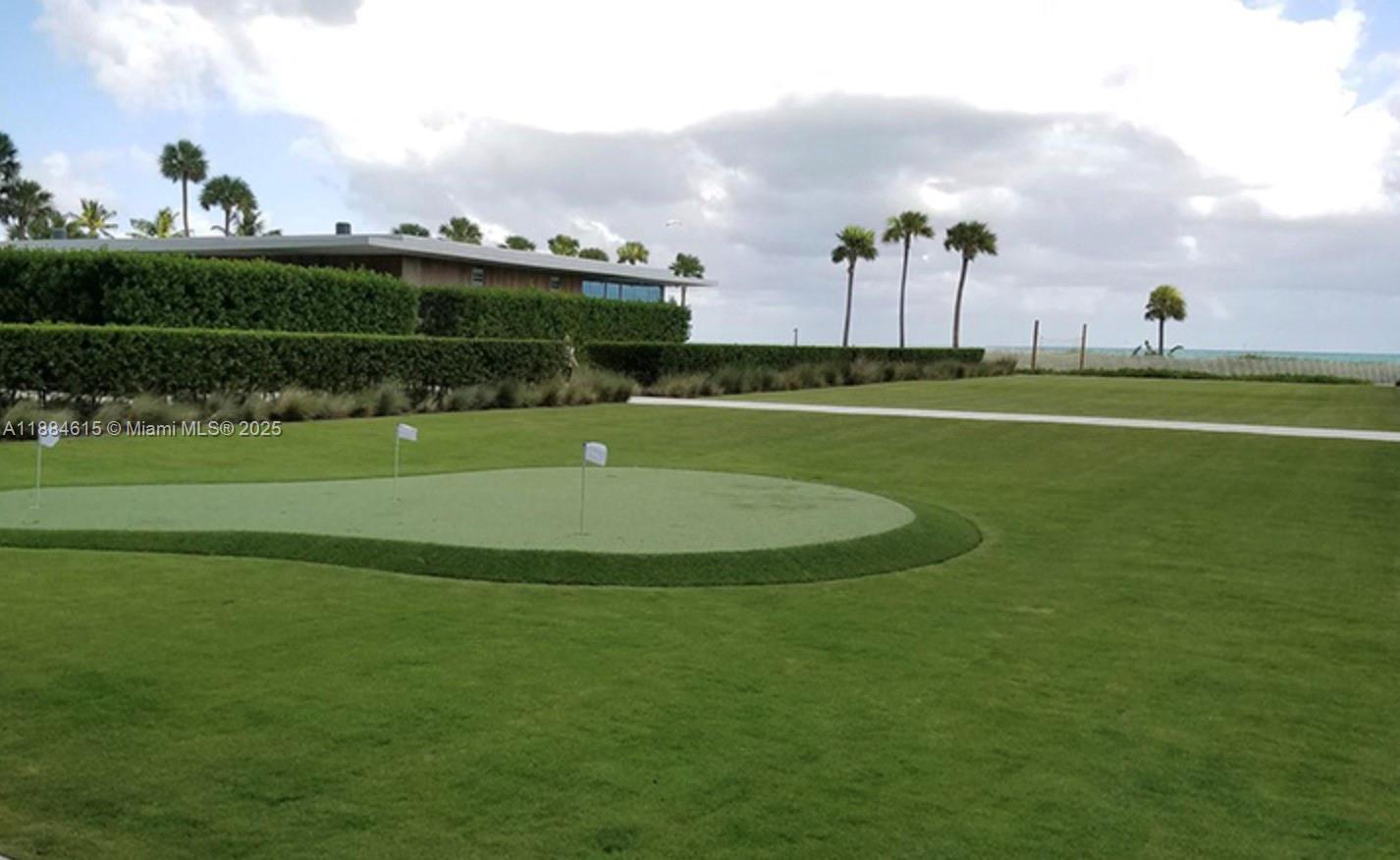 Key Biscayne Key Biscayne, FL 33149 - Photo 14 of 17 a view of a golf course with a lake