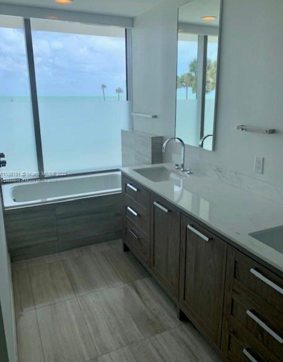 Key Biscayne Key Biscayne, FL 33149 - Photo 9 of 17 a bathroom with a sink and a mirror