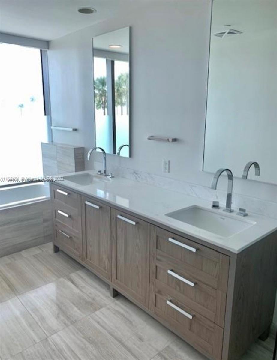 Key Biscayne Key Biscayne, FL 33149 - Photo 10 of 17 a kitchen with a sink cabinets and window
