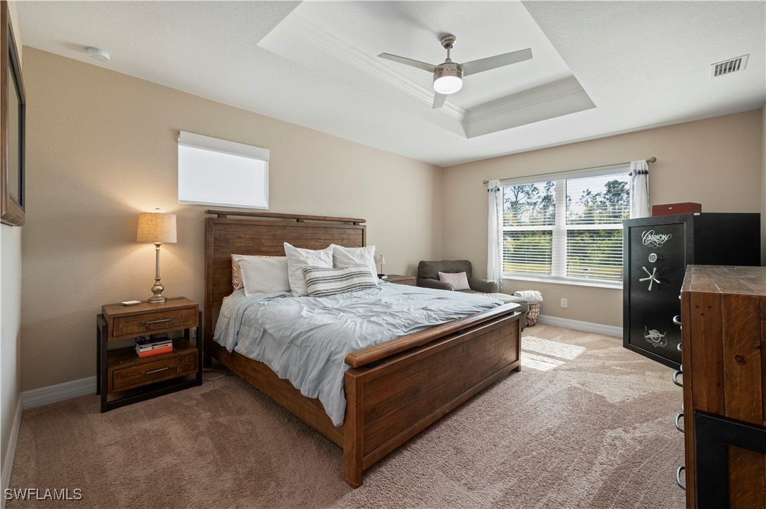 1606 Navigator Road Punta Gorda, FL 33983 - Photo 18 of 47 a bed room with a bed and a television