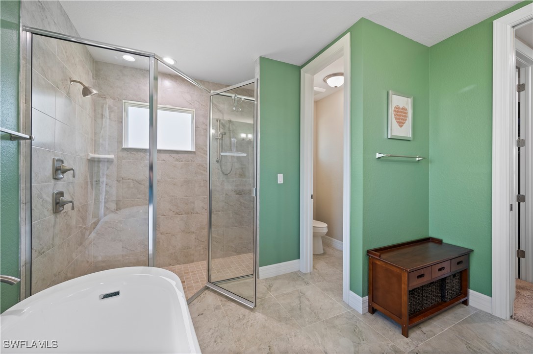 1606 Navigator Road Punta Gorda, FL 33983 - Photo 24 of 47 a bathroom with a glass shower door and a sink