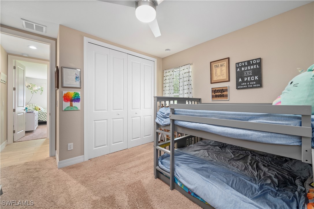 1606 Navigator Road Punta Gorda, FL 33983 - Photo 30 of 47 a bedroom with a bed and a window