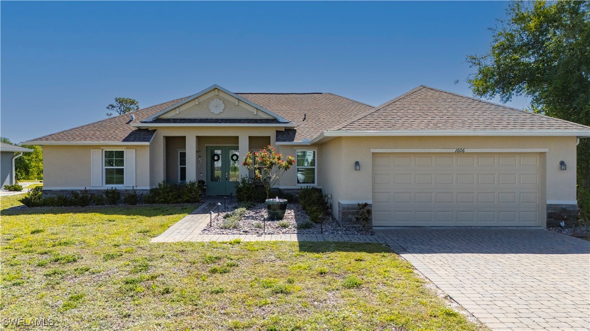 1606 Navigator Road Punta Gorda, FL 33983 - Photo 34 of 47 a front view of a house with swimming pool