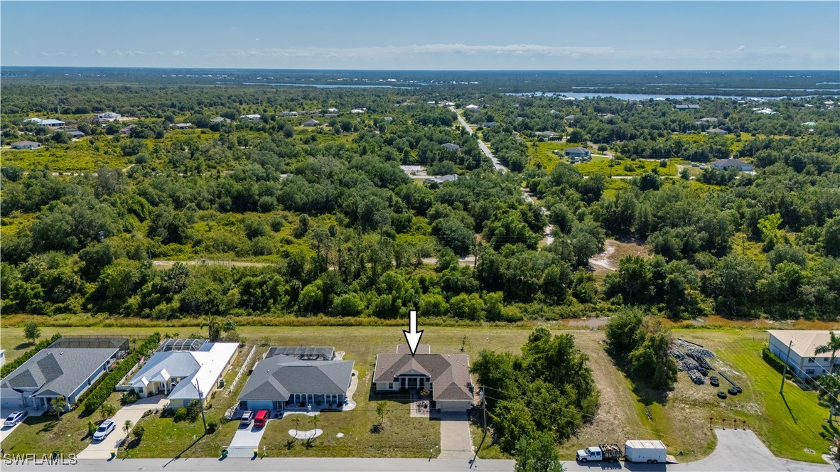 1606 Navigator Road Punta Gorda, FL 33983 - Photo 39 of 47 an aerial view of a houses with a yard