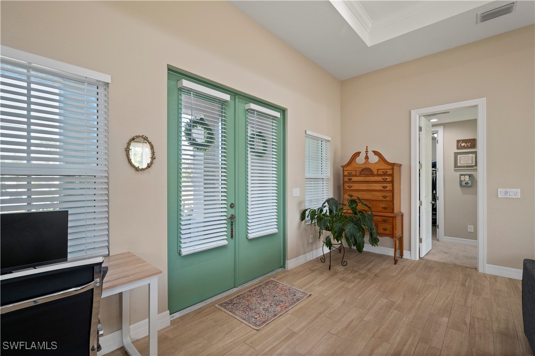 1606 Navigator Road Punta Gorda, FL 33983 - Photo 4 of 47 a living room with furniture and a window