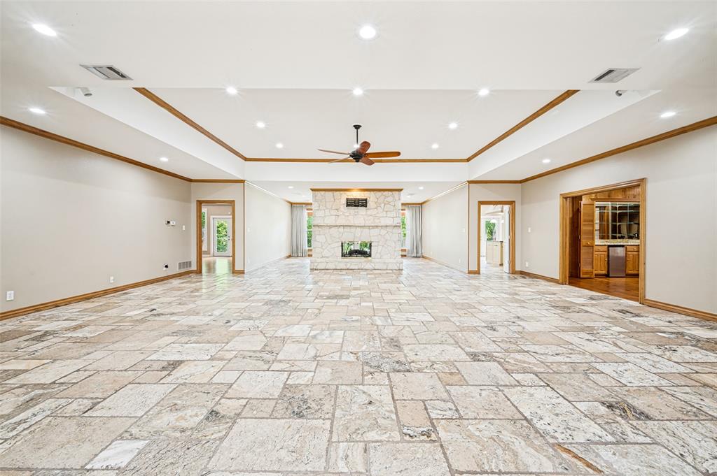 9 Country Ridge Road Melissa, TX 75454 - Photo 6 of 37 Huge living room as you enter the front door with a beautiful tray ceiling!