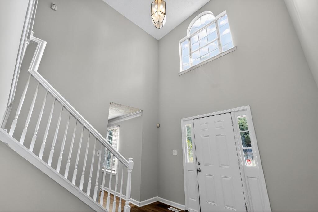 3737 Waldrop Road Decatur, GA 30034 - Photo 12 of 28 a view of staircase with railing and white walls
